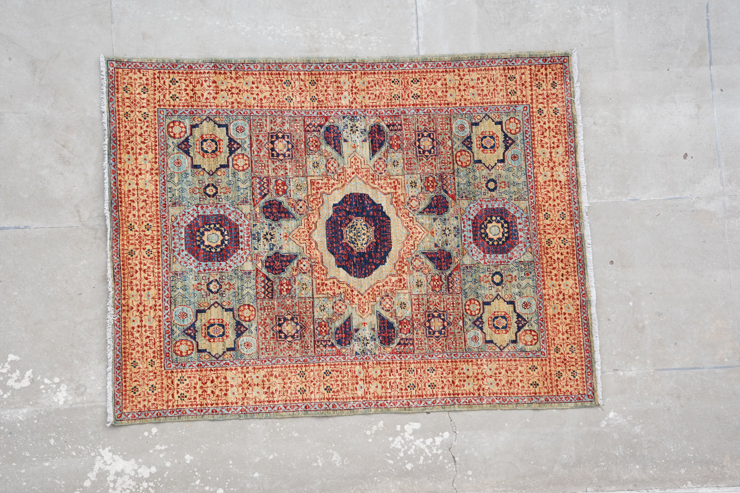 The Arched Heritage: Traditional Afghan Rug in Earthy Tones
